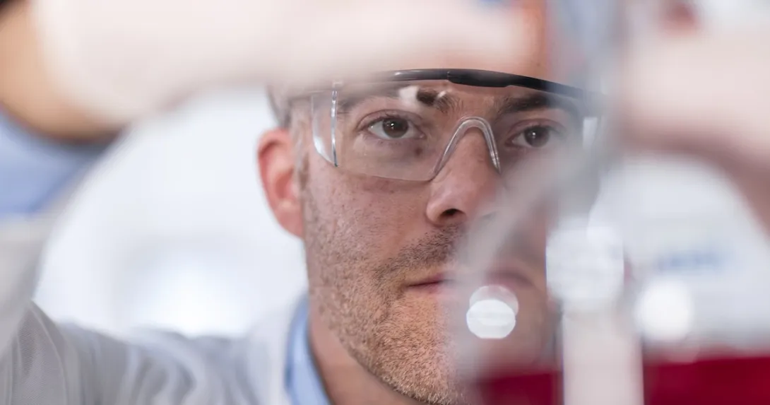 Technician working in a lab Technician working in a lab