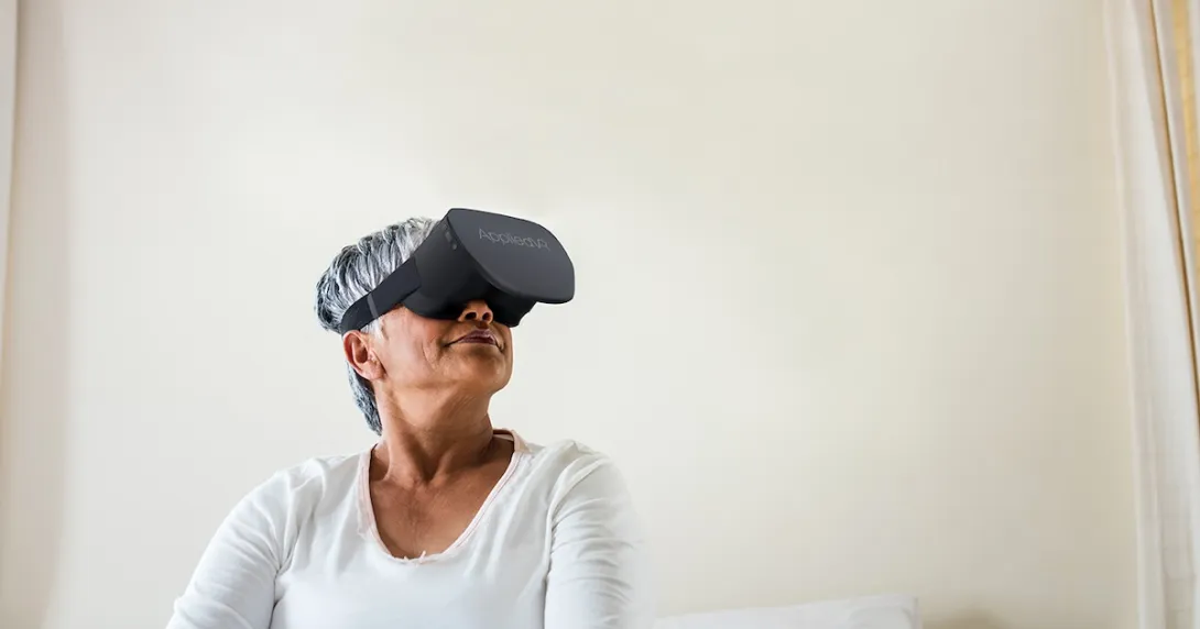 A woman wearing an AppliedVR headset A woman wearing an AppliedVR headset