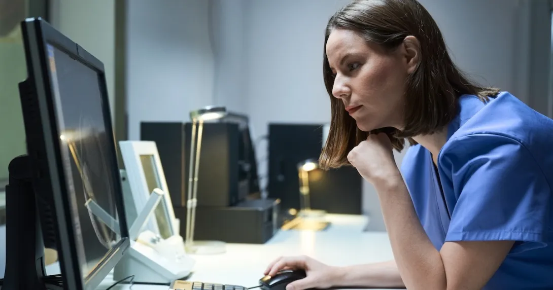 Healthcare professional reviewing data Healthcare professional reviewing data