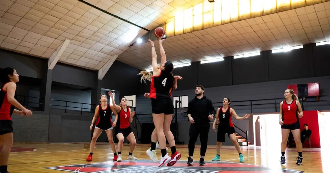 Women playing basketball Women playing basketball