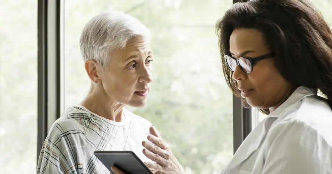 Healthcare professional consulting with patient Healthcare professional consulting with patient