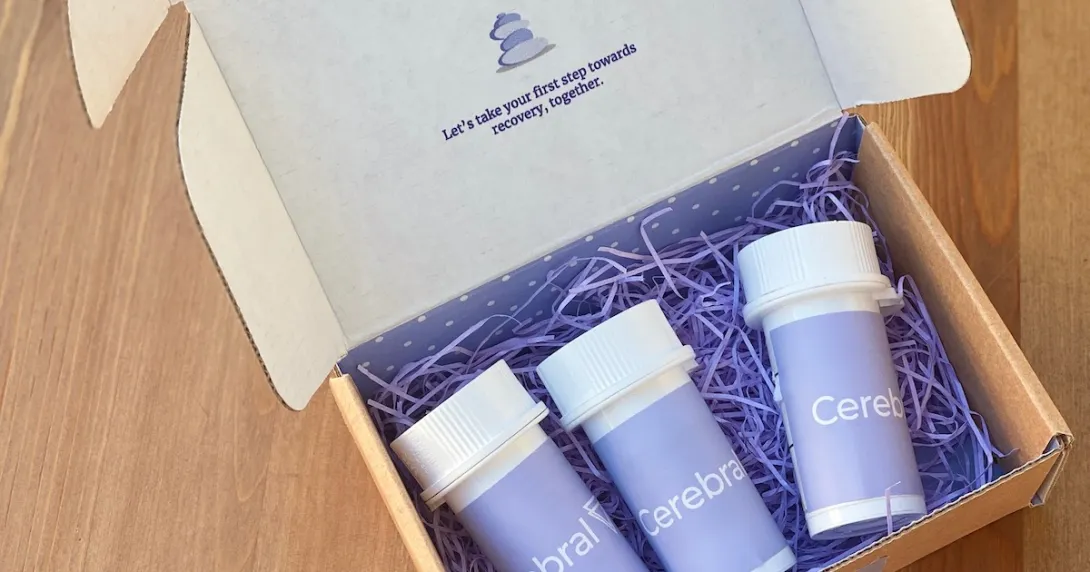 A box containing Cerebral prescriptions that reads "Let's take your first step toward recovery, together."P A box containing Cerebral prescriptions that reads "Let's take your first step toward recovery, together."