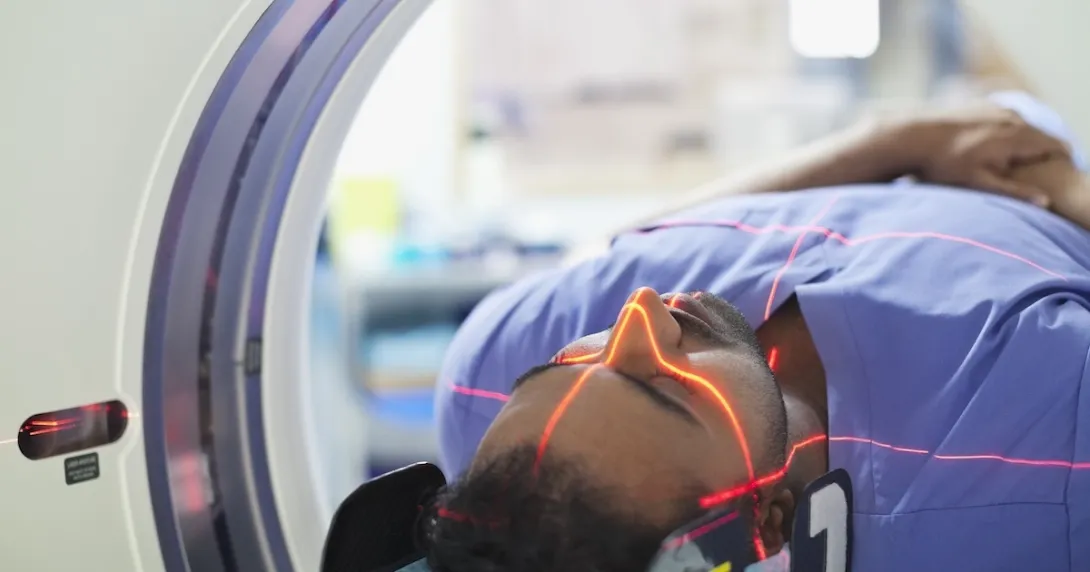 Person undergoing MRI scan Person undergoing MRI scan