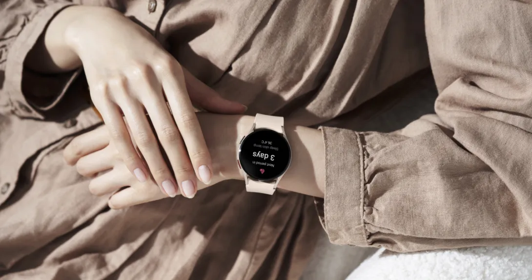 A person wearing a Samsung Galaxy Watch5 displaying a period prediction. A person wearing a Samsung Galaxy Watch5 displaying a period prediction.