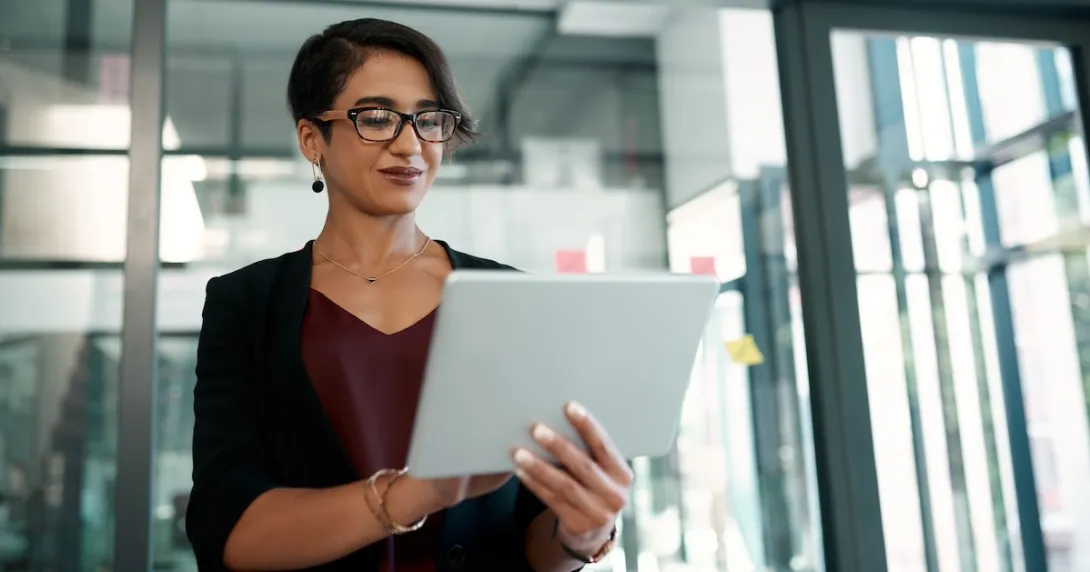 Person reviewing data on a laptop Person reviewing data on a laptop