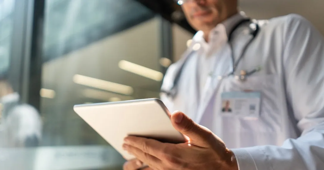 Clinician using a tablet PC Clinician using a tablet PC