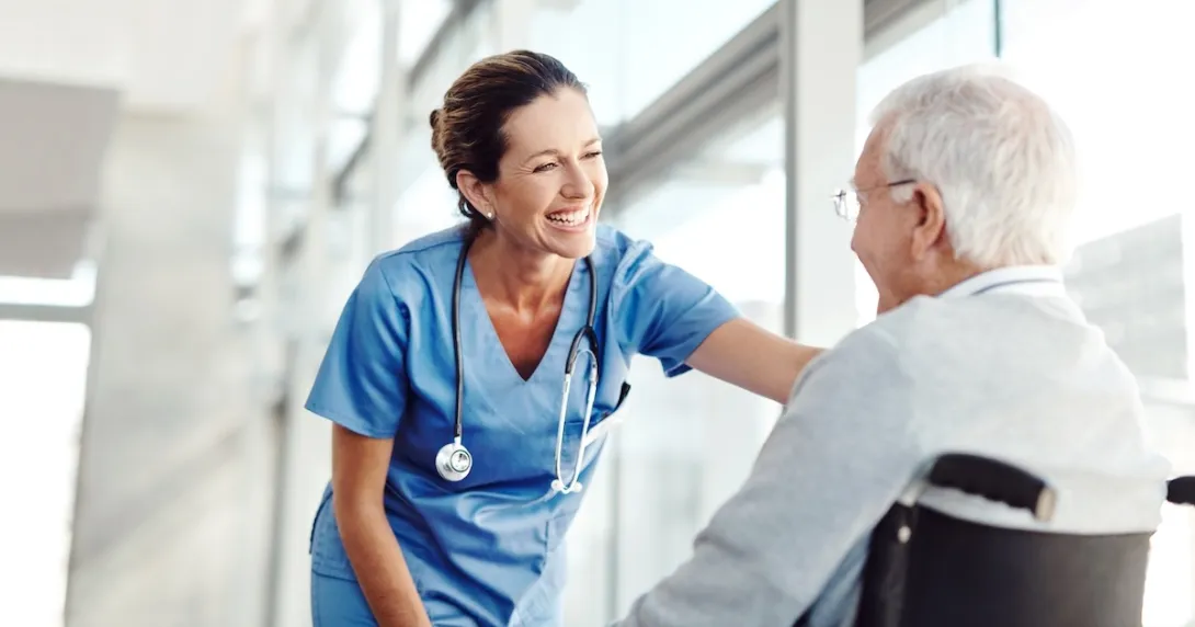 Healthcare professional with senior adult Healthcare professional with senior adult