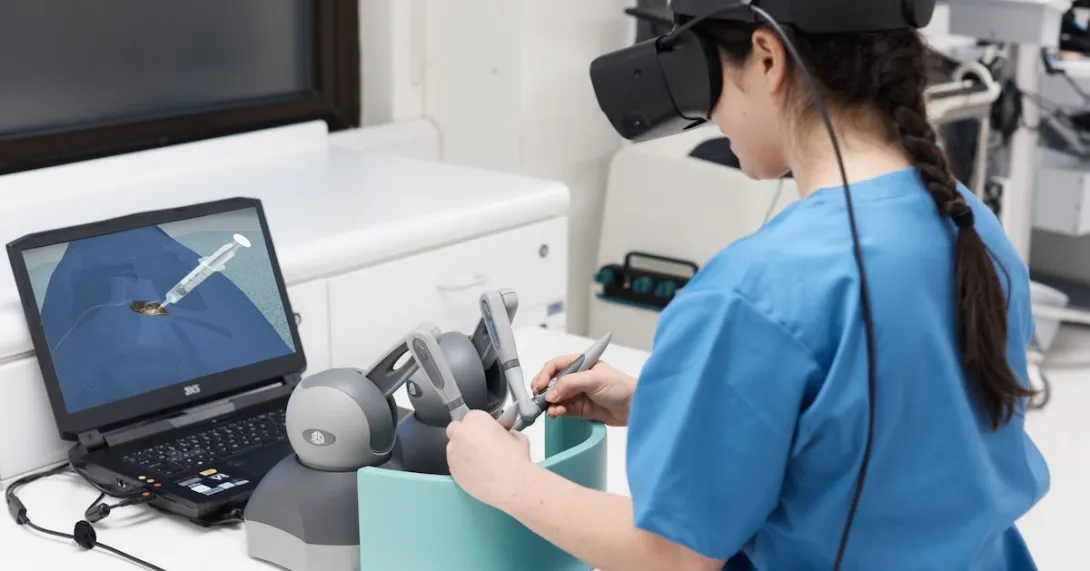 A person using the FundamentalVR platform for surgery training. A person using the FundamentalVR platform for surgery training.