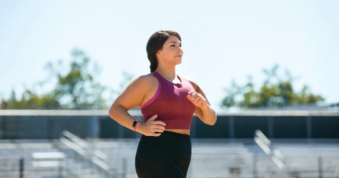 A woman working out wearing a Fitbit Inspire 2 A woman working out wearing a Fitbit Inspire 2