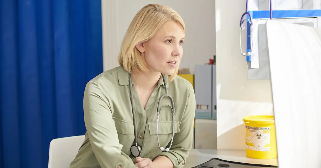 Healthcare provider sitting in a room