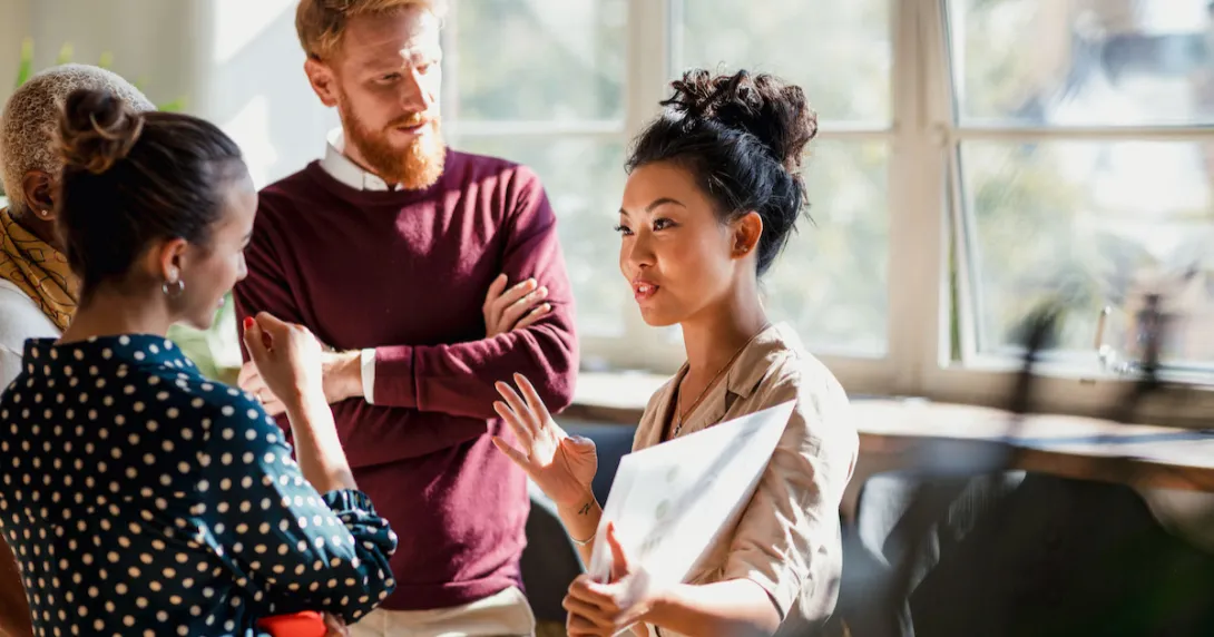 People standing around talking People standing around talking