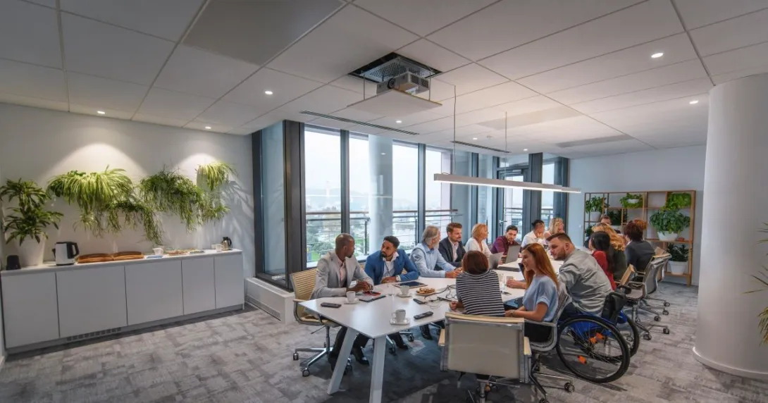 people sitting around glass table talking about business. people sitting around glass table talking about business.
