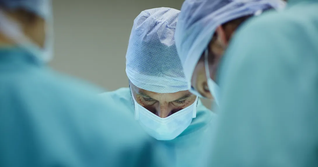 Surgeons performing an operation Surgeons performing an operation