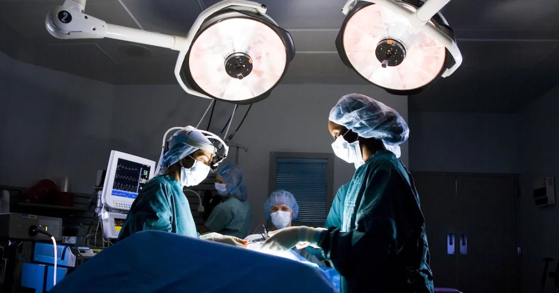 Doctors performing a surgical operation Doctors performing a surgical operation