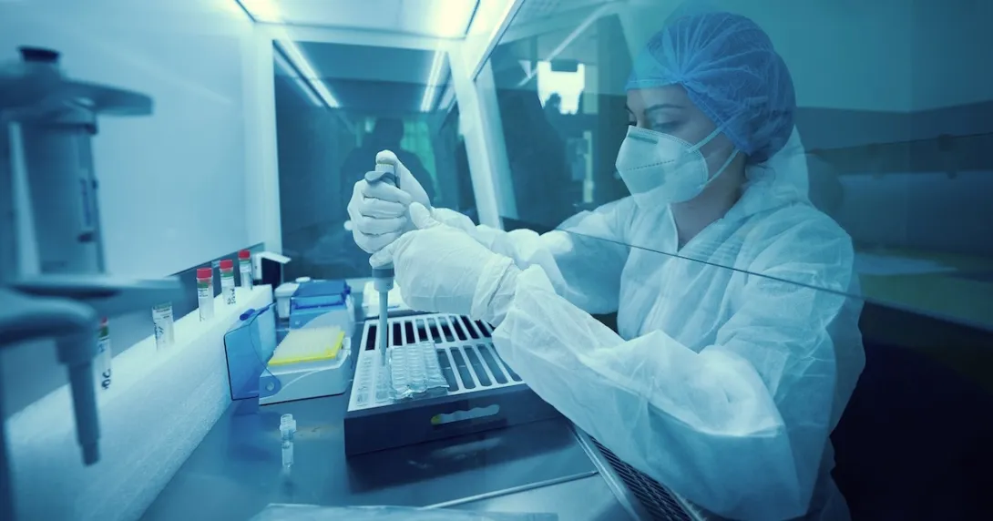 Technician working in a lab Technician working in a lab