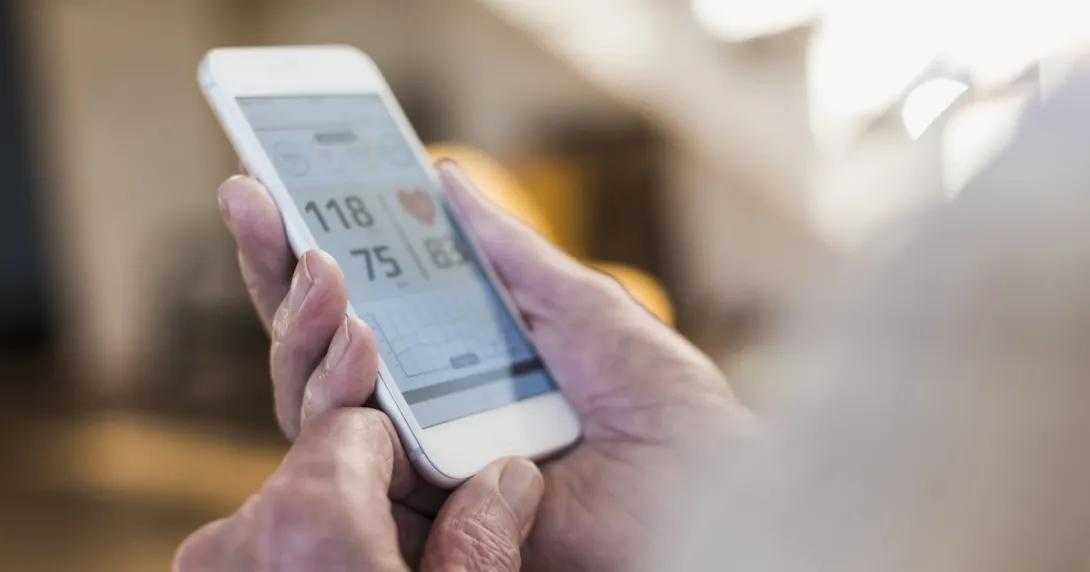 Photo of a smart phone showing blood pressure reading Photo of a smart phone showing blood pressure reading