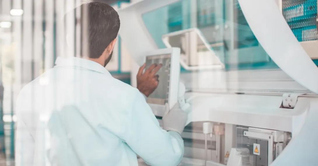 Technician working in a lab Technician working in a lab