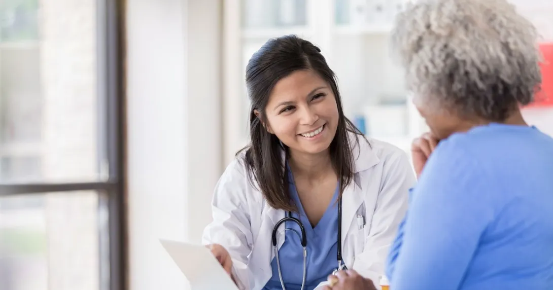 Healthcare professional counseling patient Healthcare professional counseling patient