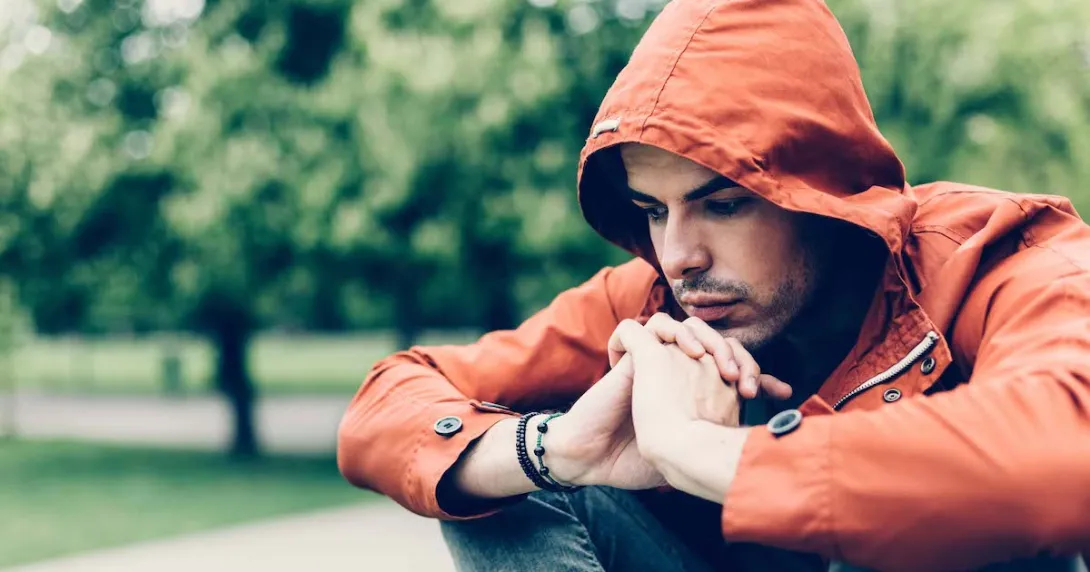 Person sitting in a park Person sitting in a park