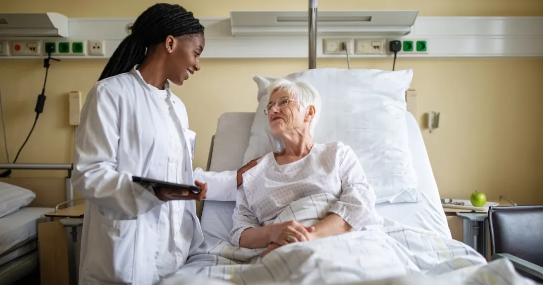 Healthcare professional consulting with a patient in the hospital Healthcare professional consulting with a patient in the hospital