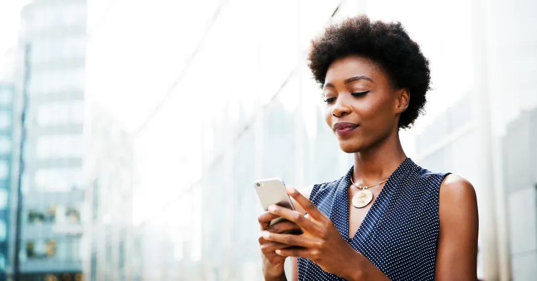 Patient looking at medical records on smart phone Patient looking at medical records on smart phone