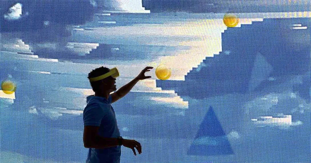 Silhouette of man interacting with a virtual environment while wearing a VR headset Silhouette of man interacting with a virtual environment while wearing a VR headset