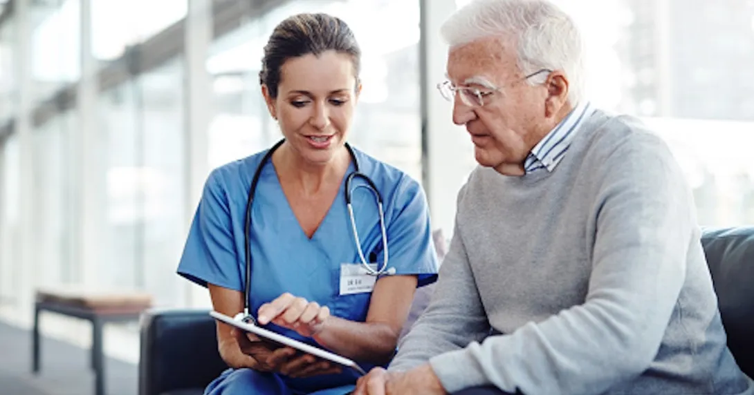 Heathcare professional consulting with patient. Heathcare professional consulting with patient.