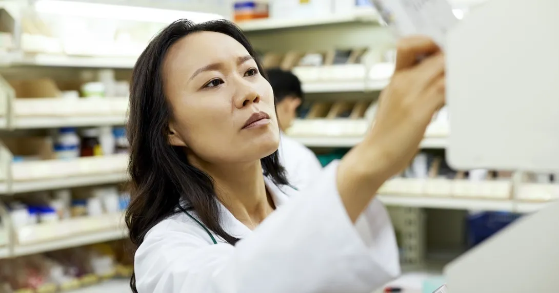 Pharmacist preparing a prescription Pharmacist preparing a prescription