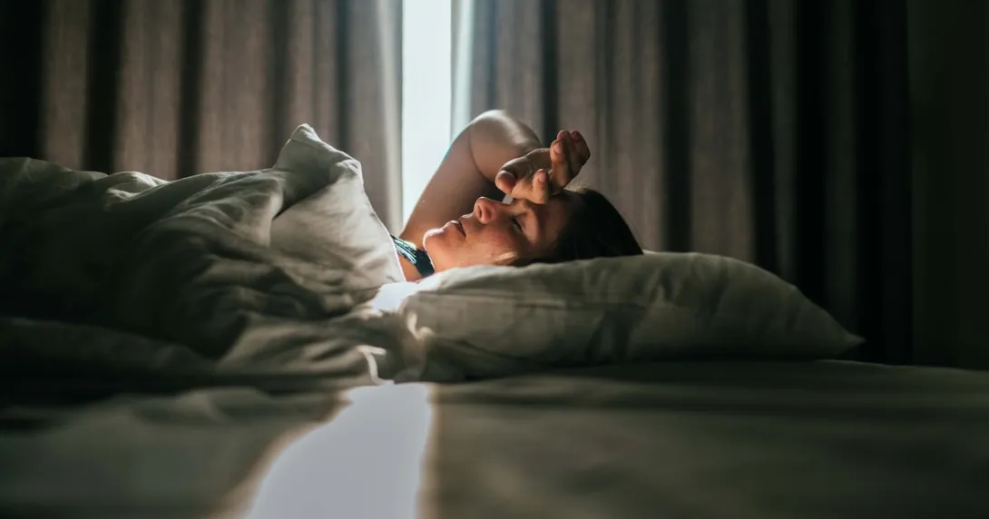 Person lying in bed Person lying in bed