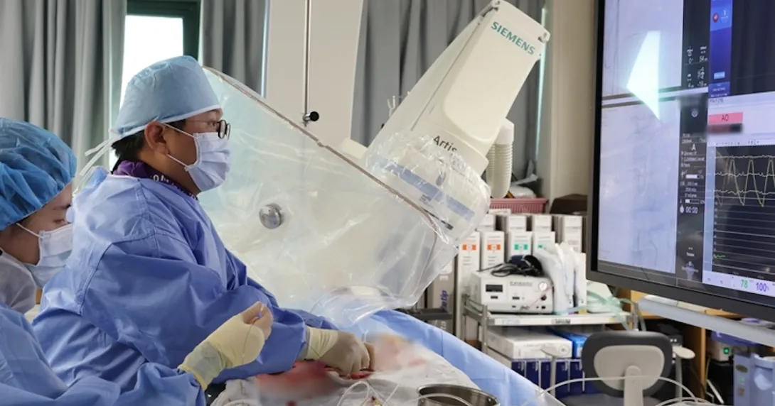 A surgeon conducting a stent procedure A surgeon conducting a stent procedure