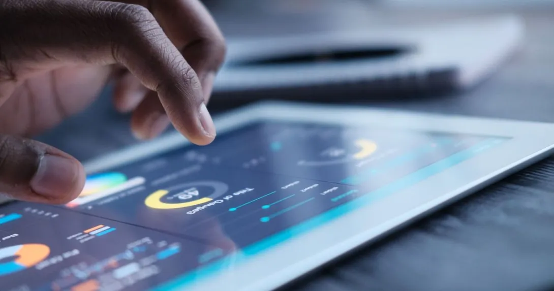 A close up of an iPad showing data analysis