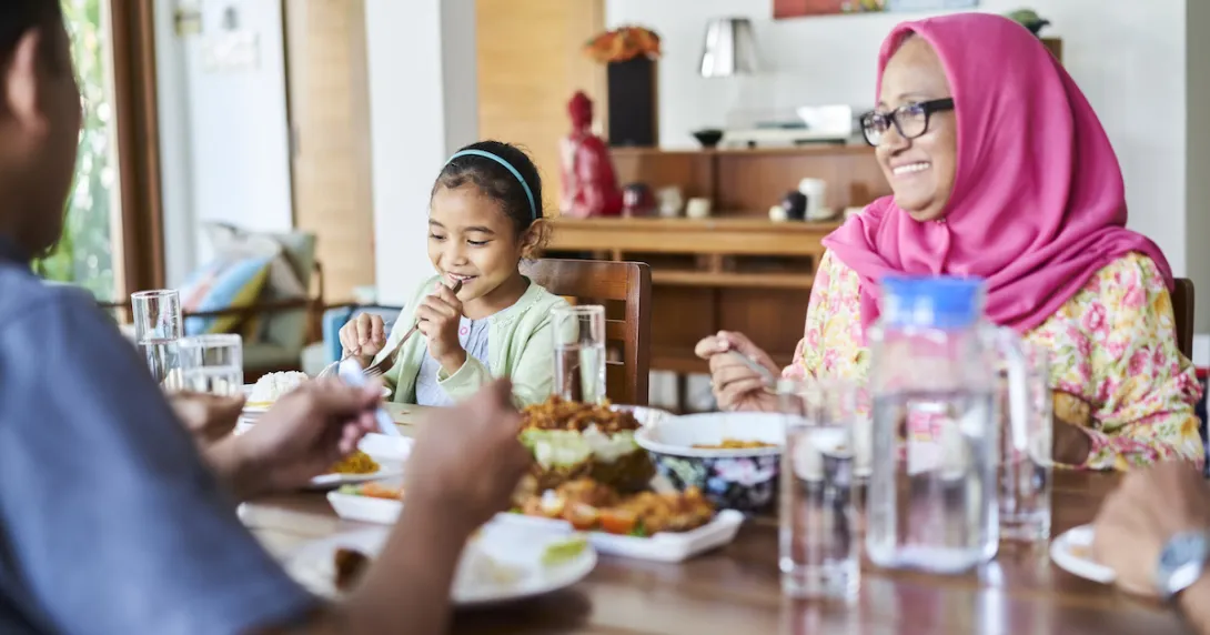 A family eating dinner A family eating dinner