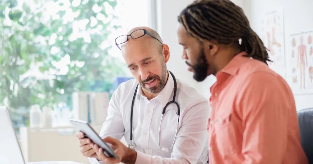 A man talking to his primary care provider