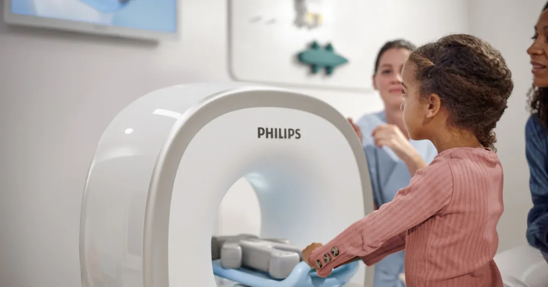 A child using the Kitten Scanner