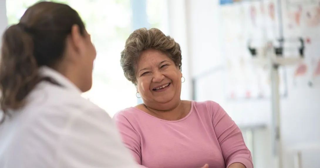 Older woman speaking with the doctor about her concerns Older woman speaking with the doctor about her concerns