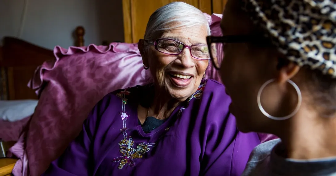 Two people looking at each other and smiling Two people looking at each other and smiling