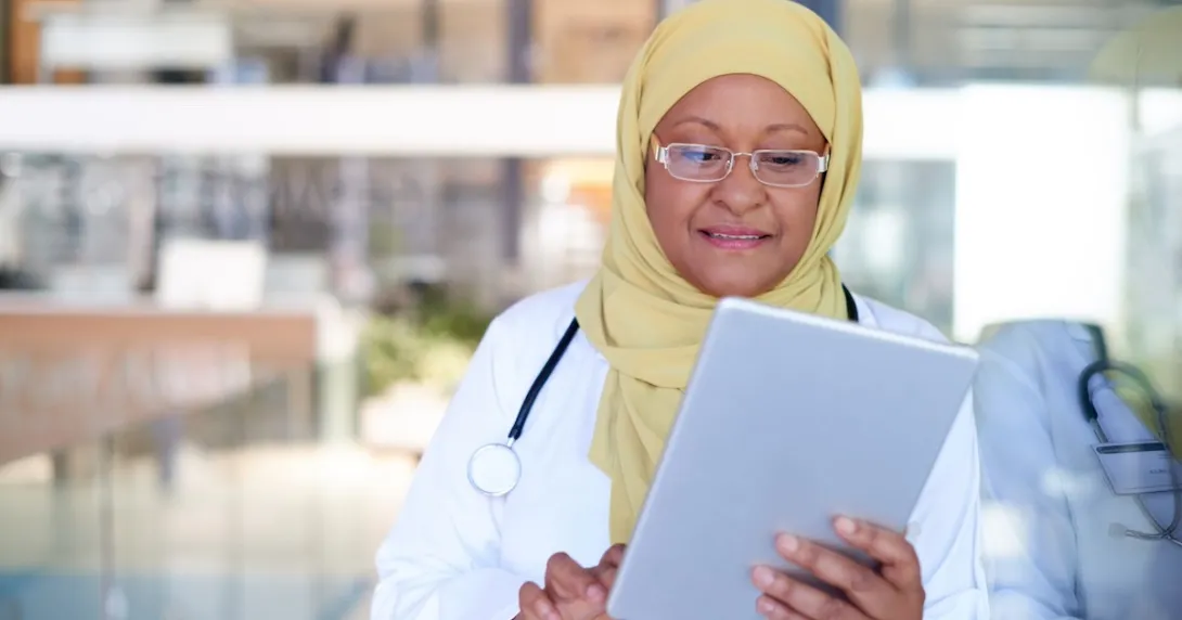 Healthcare provider on a tablet Healthcare provider on a tablet