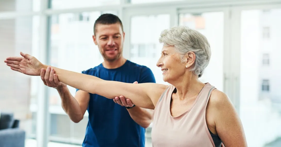 Two people stretching together Two people stretching together