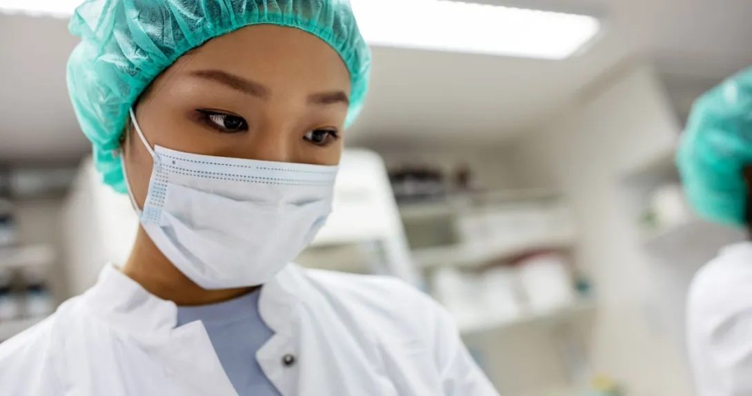 Healthcare professional in a pharmacy setting Healthcare professional in a pharmacy setting