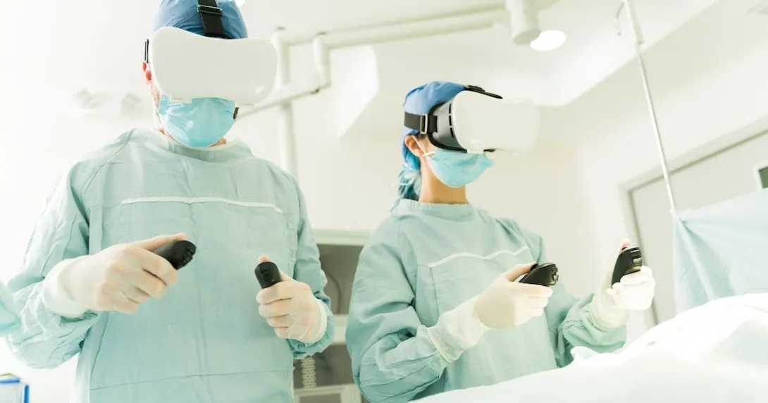 Healthcare providers in an operating room wearing extended reality headset while standing over a patient Healthcare providers in an operating room wearing an extended reality headset while standing over a patient