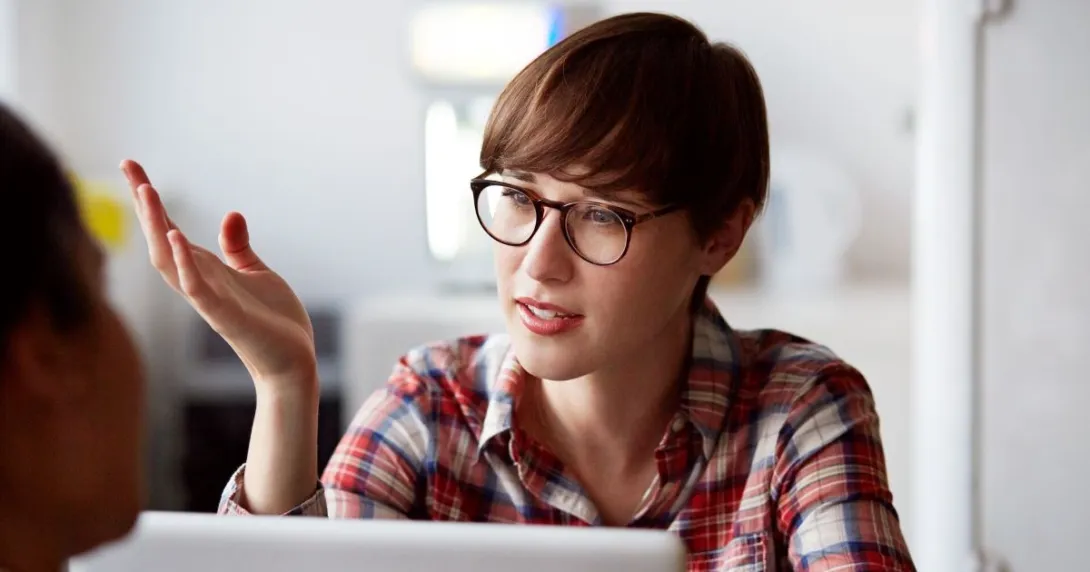 Person looking at open laptop Person looking at open laptop