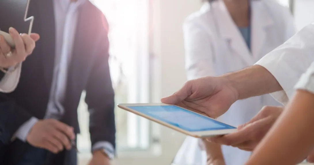 Hospital management signing a contract Hospital management signing a contract