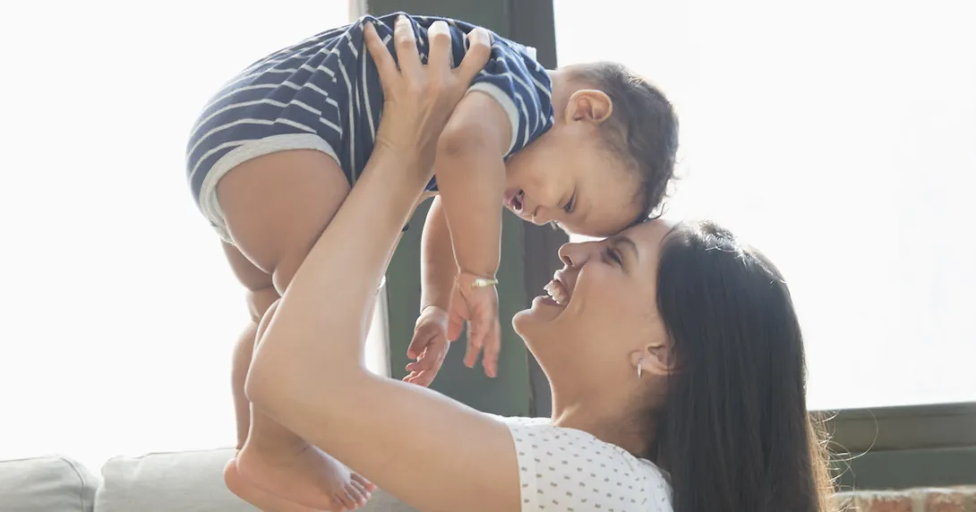 A person holding a baby A person holding a baby